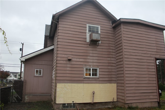 view of side of property featuring cooling unit