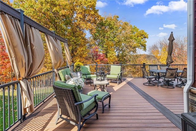 deck with an outdoor hangout area