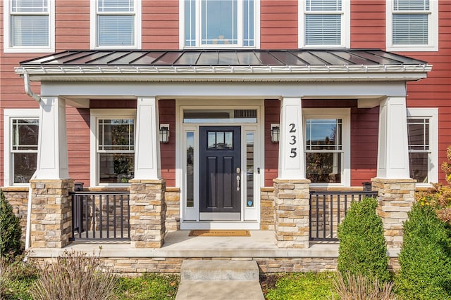 entrance to property with a porch