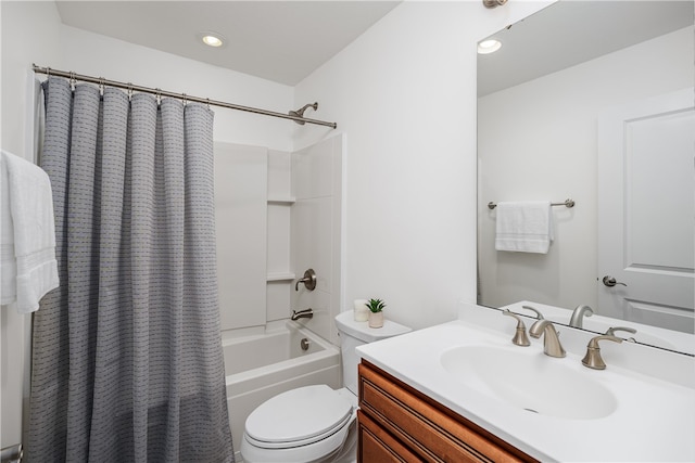 full bathroom featuring toilet, vanity, and shower / bath combination with curtain