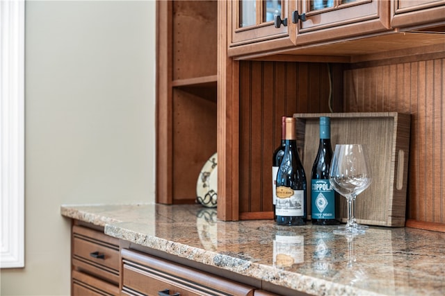 room details with wood walls and indoor bar