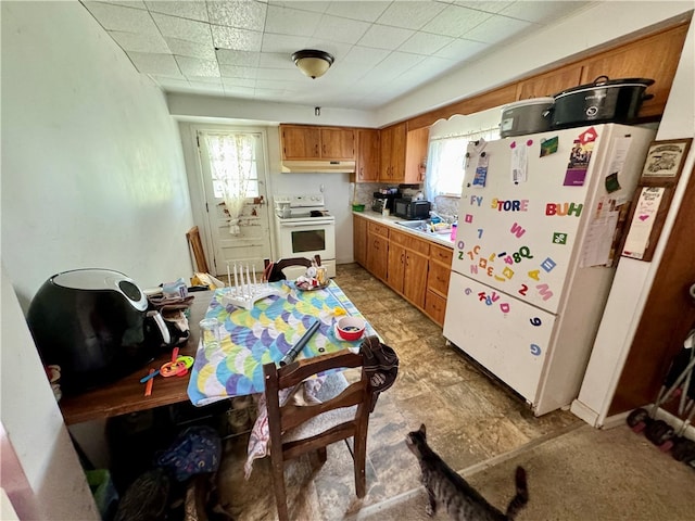 kitchen featuring white appliances