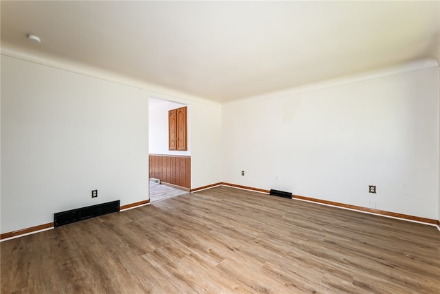 spare room with light wood-type flooring