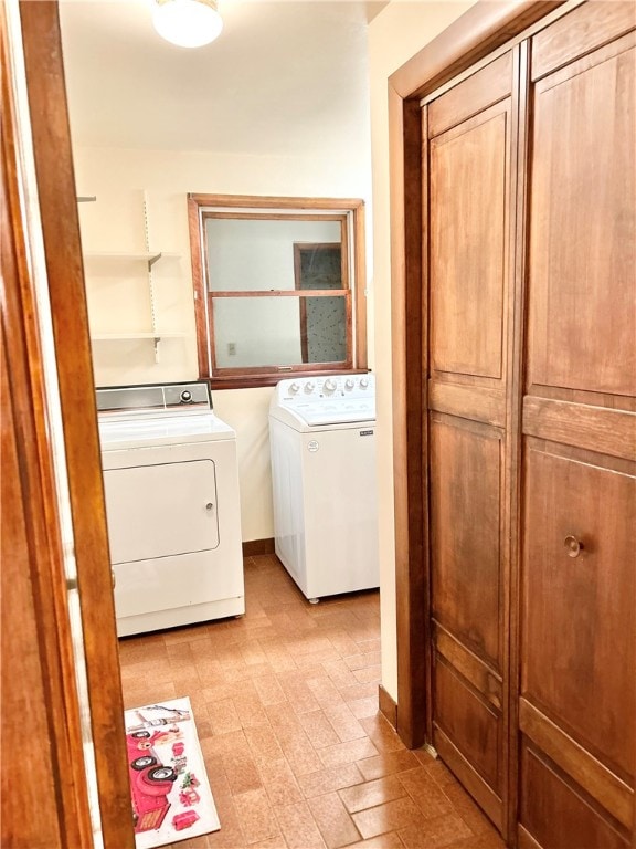 laundry room with washer and clothes dryer