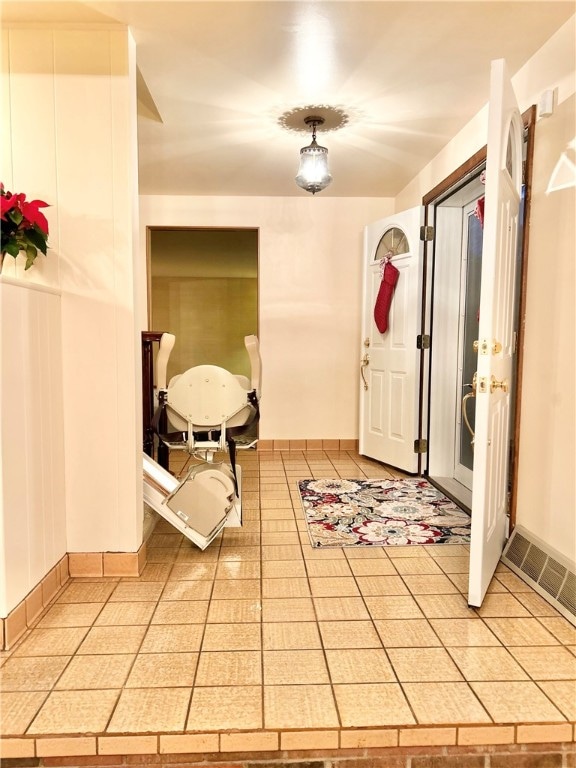 interior space with light tile patterned floors