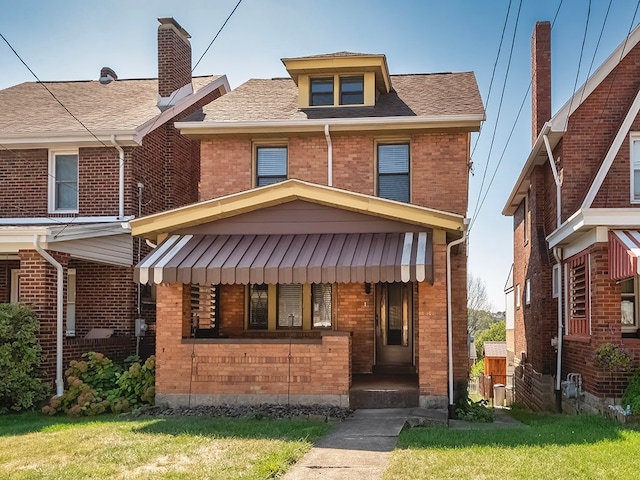 view of front facade with a front lawn