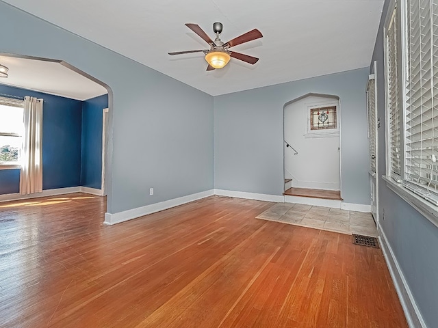 interior space with hardwood / wood-style flooring and ceiling fan