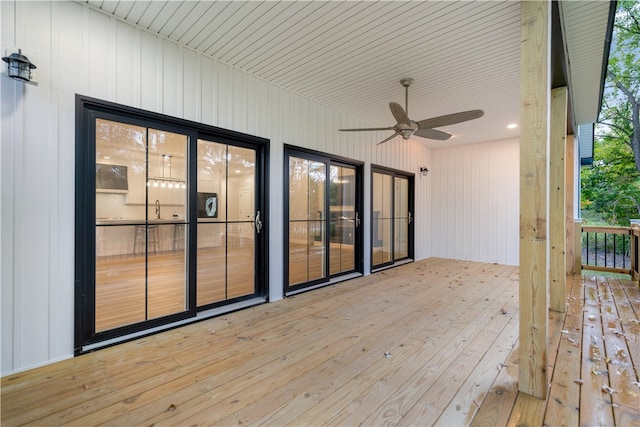 wooden terrace with ceiling fan