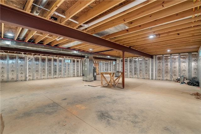 basement featuring heating unit