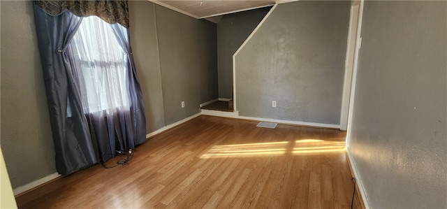 empty room featuring hardwood / wood-style floors