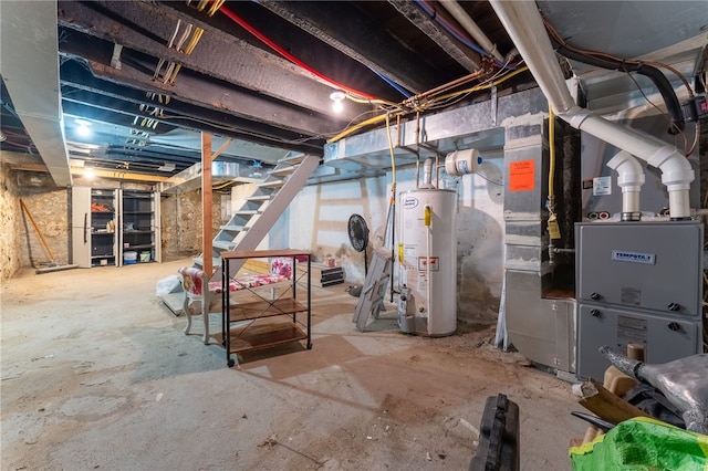 basement featuring heating unit and gas water heater