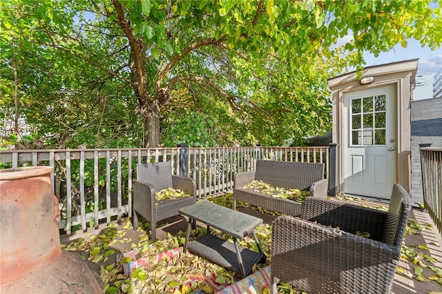 deck with an outdoor hangout area