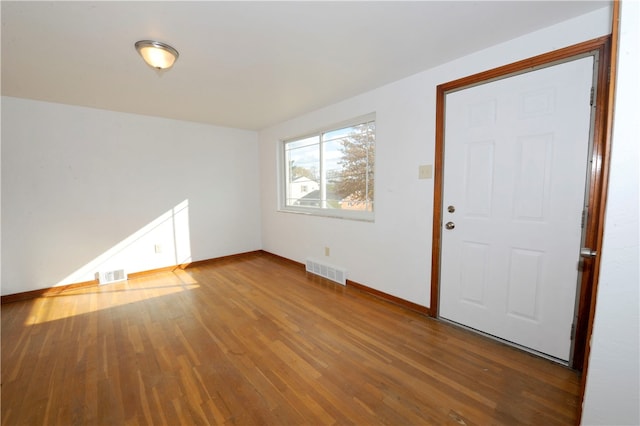 foyer with hardwood / wood-style flooring