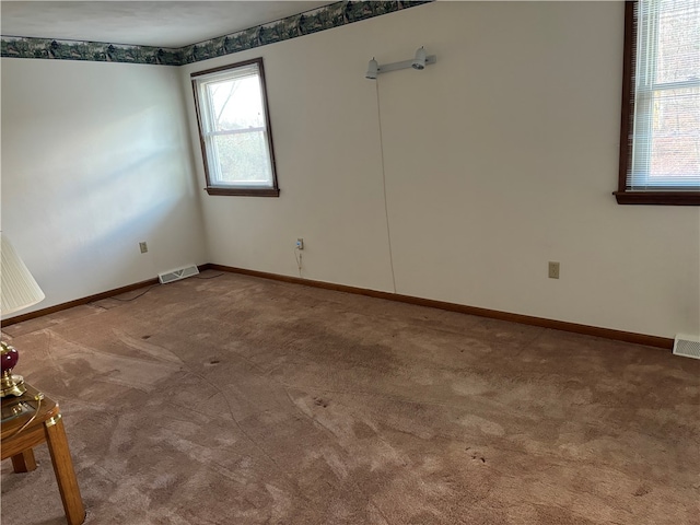 view of carpeted spare room