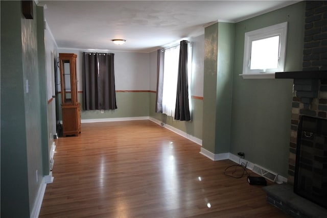 spare room featuring hardwood / wood-style flooring