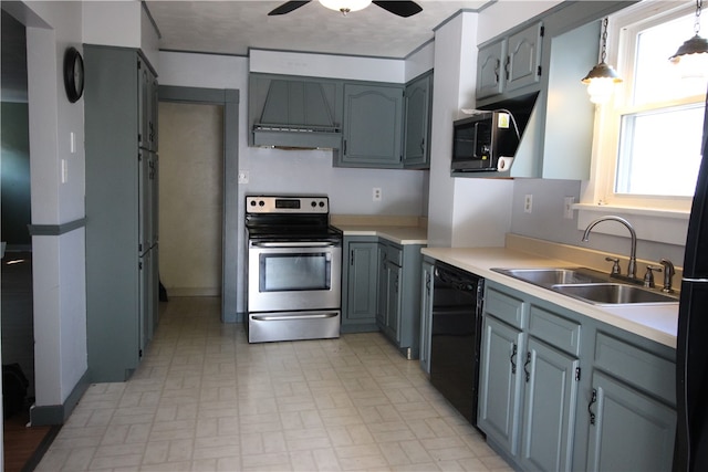 kitchen with appliances with stainless steel finishes, premium range hood, ceiling fan, sink, and pendant lighting