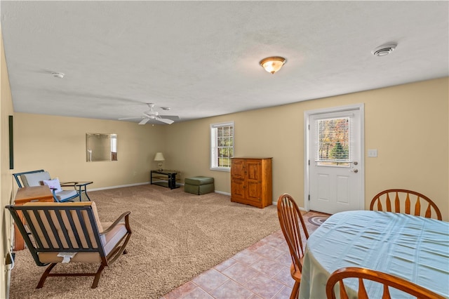 interior space featuring a textured ceiling and ceiling fan