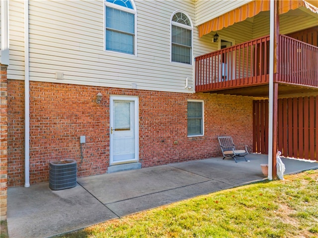 back of property with a patio and cooling unit