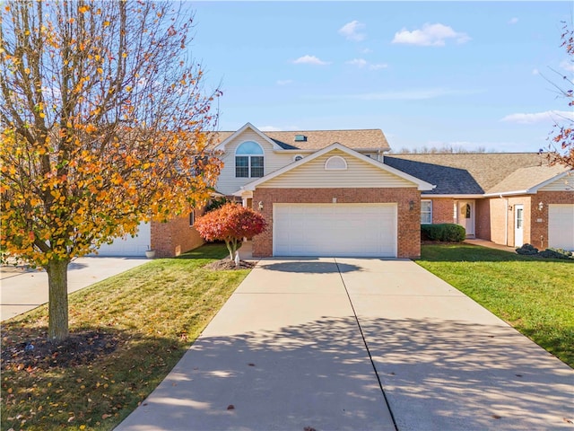 front of property with a garage and a front yard