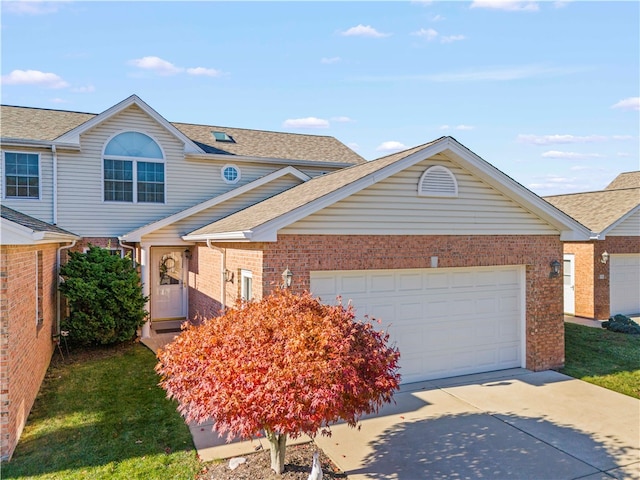 view of front of property with a garage