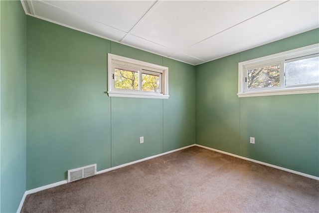 empty room featuring carpet floors