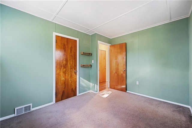 unfurnished bedroom featuring carpet floors