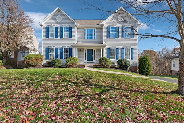 view of front of property featuring a front yard