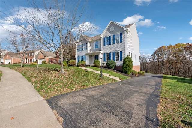 view of front of home with a front lawn