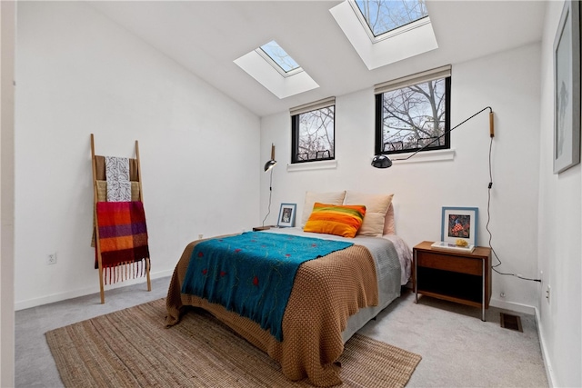 bedroom featuring light colored carpet and lofted ceiling