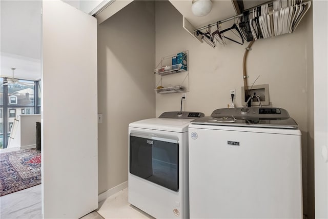 laundry room featuring separate washer and dryer