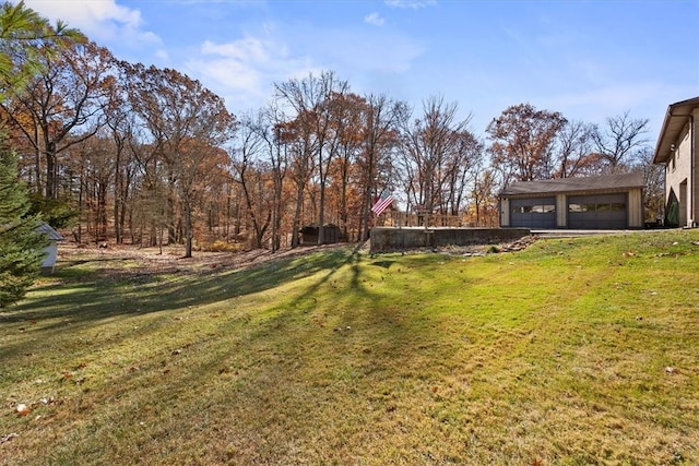 view of yard with a garage