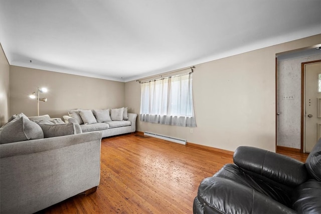 living room featuring a baseboard radiator and wood-type flooring