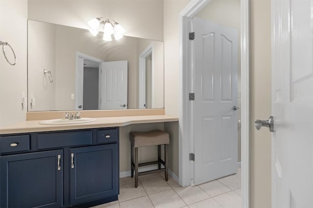 bathroom featuring vanity and tile patterned flooring