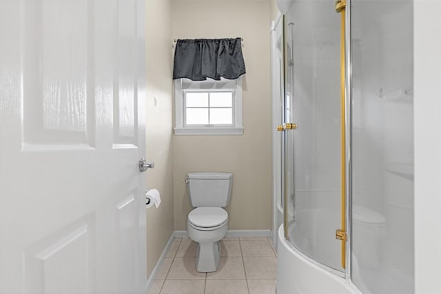 bathroom featuring toilet and tile patterned flooring