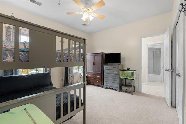 carpeted bedroom with ceiling fan