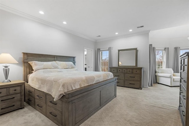 bedroom with light colored carpet and crown molding