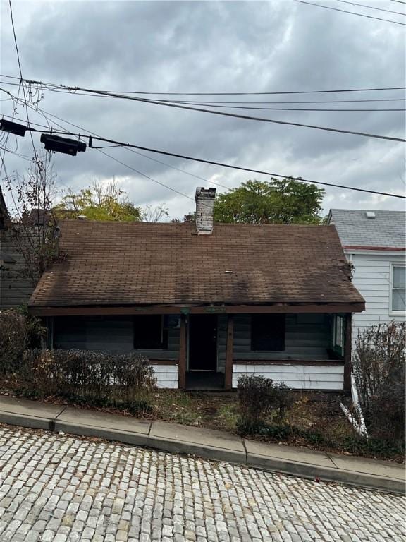 1204 Sutherland St, Sheraden, PA 15204 - view of front of home featuring a chimney