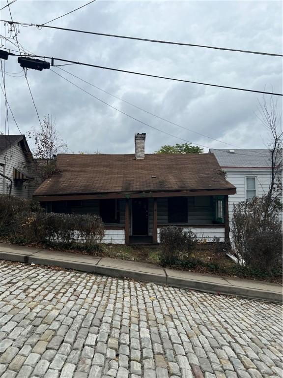 1204 Sutherland St, Sheraden, PA 15204 - single story home featuring a chimney