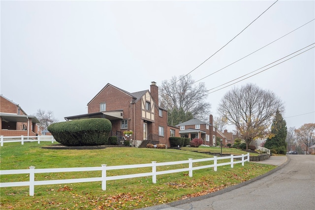 view of home's exterior with a lawn