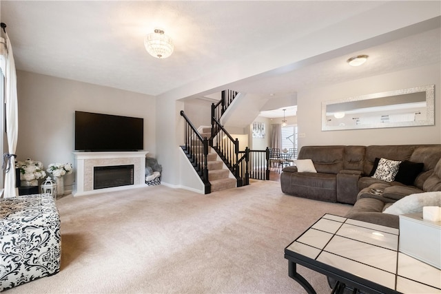 living room featuring light carpet