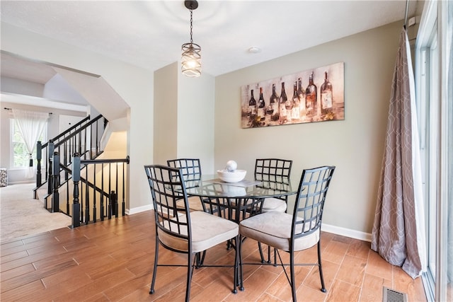 dining area featuring hardwood / wood-style floors