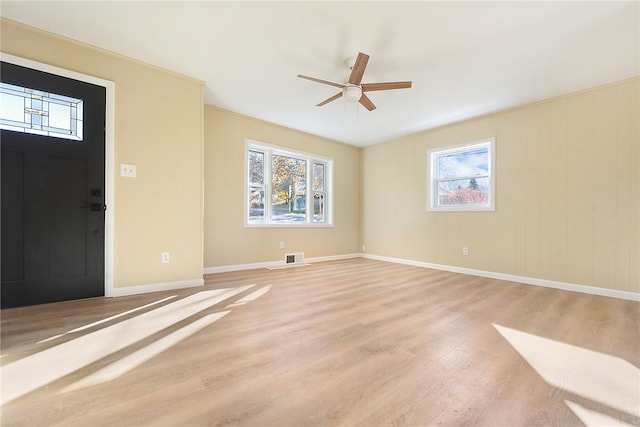 foyer featuring ceiling fan and light wood-type flooring