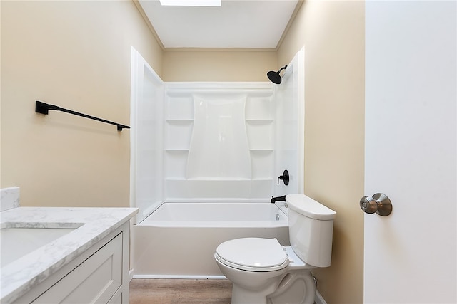 full bathroom with toilet, tub / shower combination, vanity, and hardwood / wood-style floors