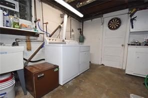 washroom with separate washer and dryer