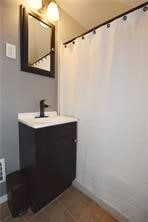 bathroom featuring vanity and tile patterned flooring