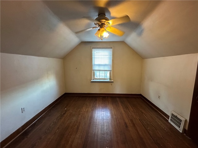 bonus room featuring ceiling fan, dark hardwood / wood-style flooring, and vaulted ceiling