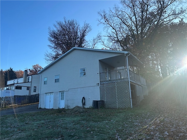 view of property exterior with a balcony