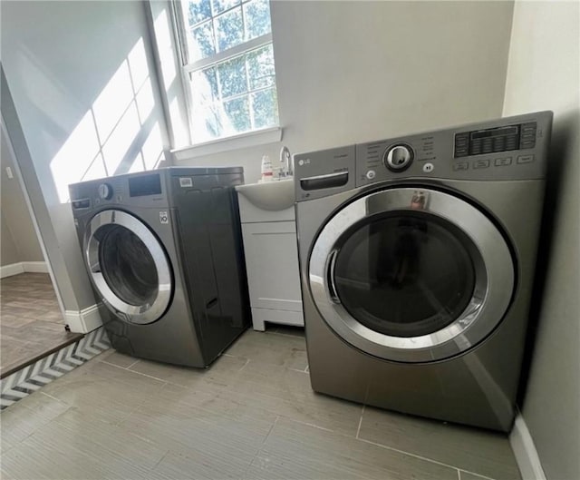 3036 Mcneal Rd, Hampton, PA 15101 - washroom featuring washer and clothes dryer and baseboards