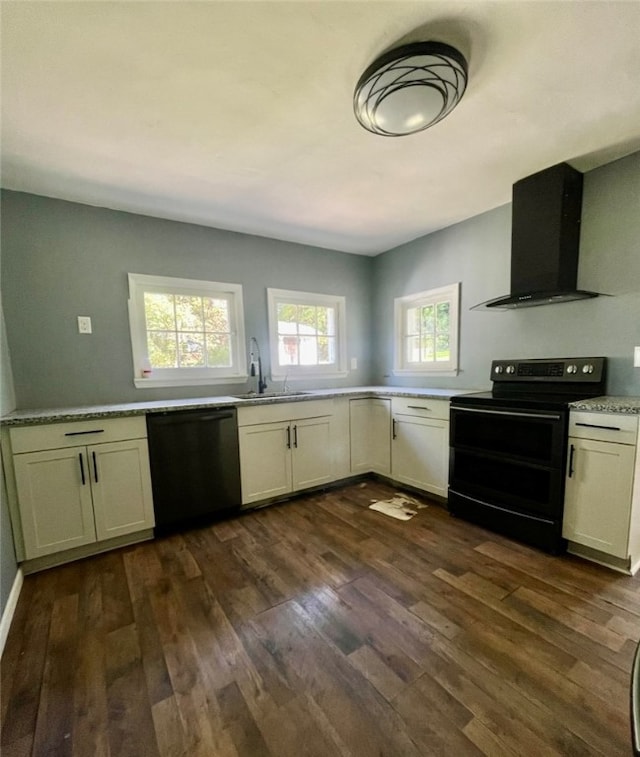 kitchen featuring ventilation hood, sink, black appliances, and dark hardwood / wood-style flooring