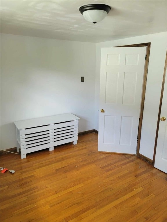 unfurnished bedroom featuring light hardwood / wood-style floors